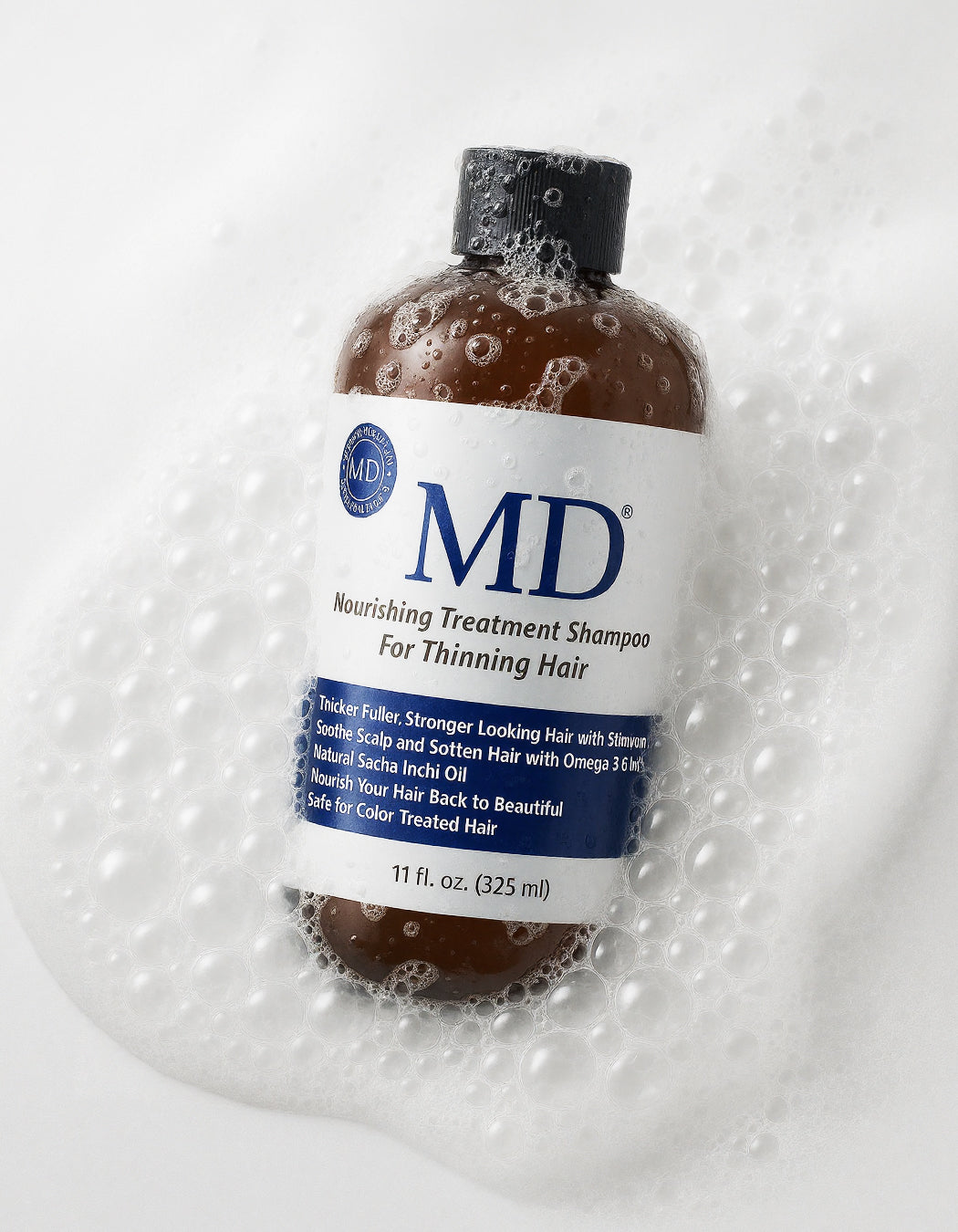 MD® Revitalizing Treatment Shampoo for thinning hair and oily scalp, part of the MD Hair system
