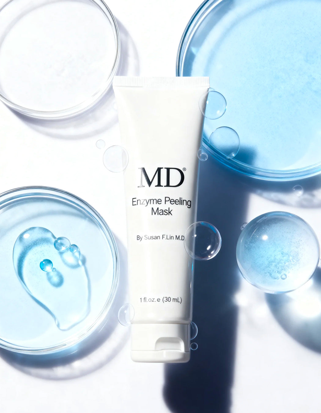 MD Enzyme Peeling Mask is a gentle yet powerful peel-off treatment that deeply exfoliates and rejuvenates your skin with natural fruit enzymes.