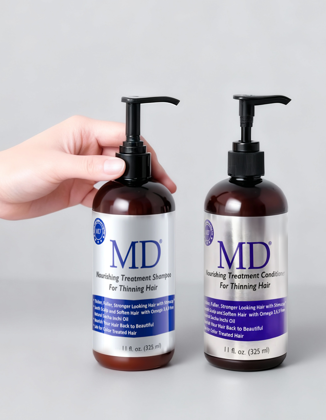 Hand holding MD Nourishing Treatment Shampoo and Conditioner from MD Hair, for thinning hair and scalp health