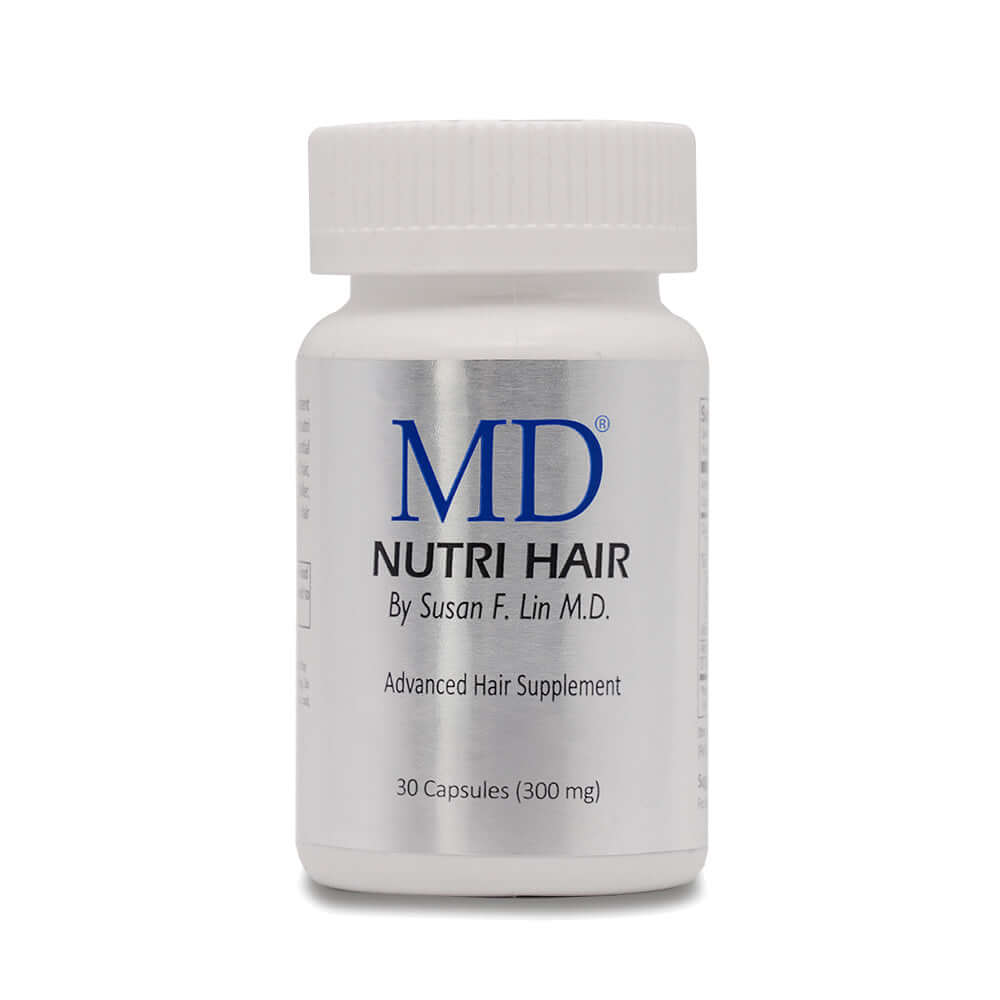Front view of MD Nutri Hair supplement bottle from MD Hair to restore scalp health and support natural hair regrowth.

